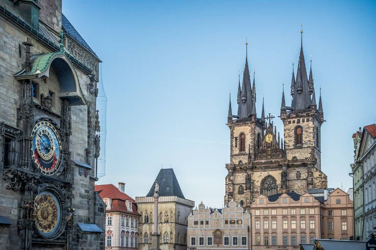 Travel guide to Czechia featuring Prague Old Town Square, Astronomical Clock, and Church of Our Lady before Týn